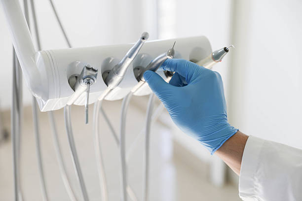 Professional Tooth Extraction technician working in Prince William County County, VA